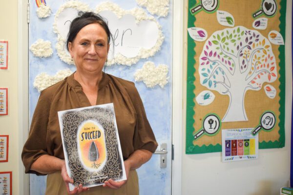 Long-serving teacher writes children's book